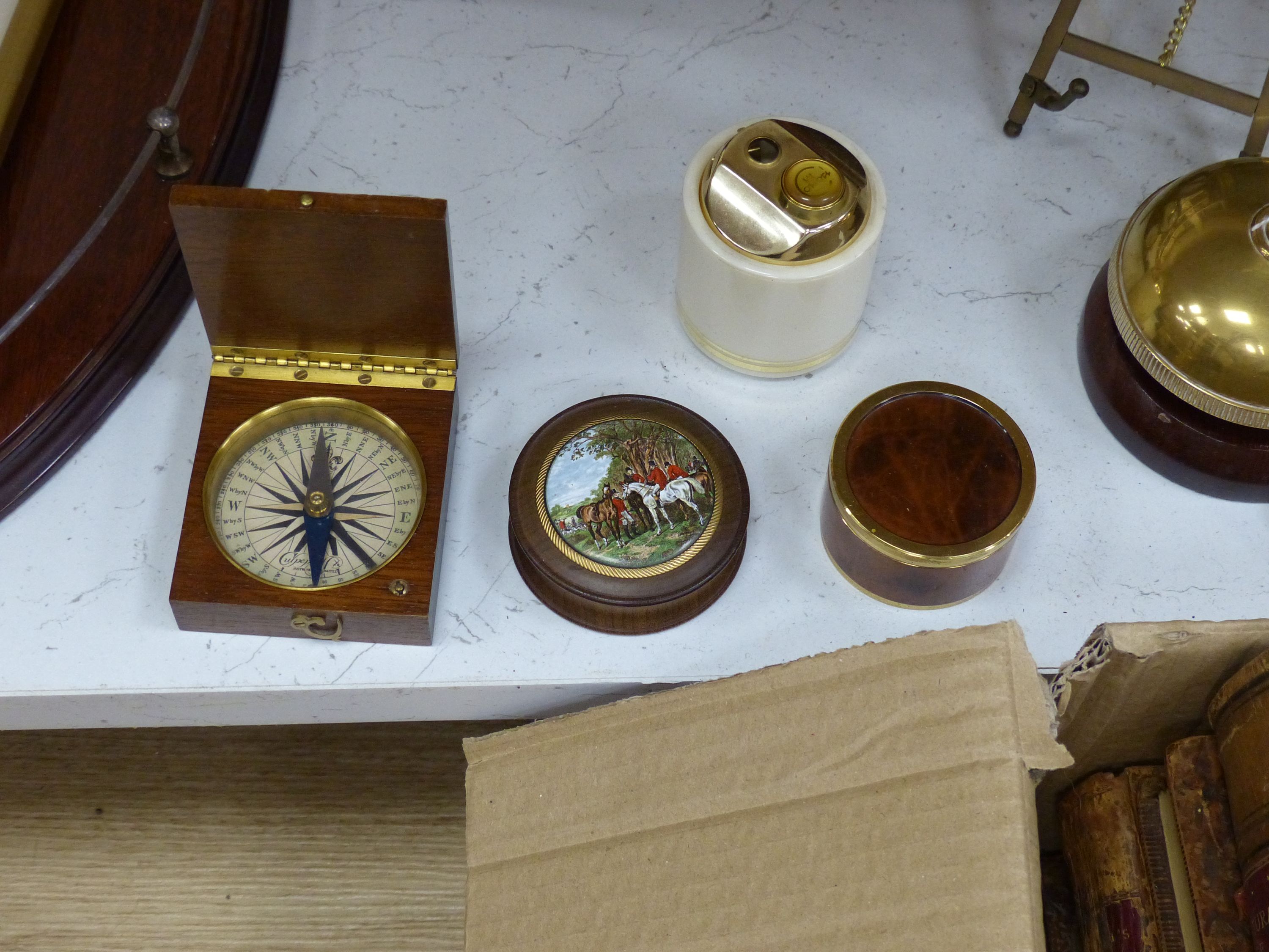 Miscellaneous items, including a brass counter bell, an oval inlaid mahogany galleried tray and four various mantel clocks